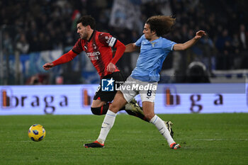 2024-03-01 - Theo Hernandez of A.C. Milan and Matteo Guendouzi of S.S. Lazio during the 27th day of the Serie A Championship between S.S. Lazio vs A.C. Milan, 1 March 2024 at the Olympic Stadium in Rome. - SS LAZIO VS AC MILAN - ITALIAN SERIE A - SOCCER