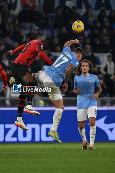 2024-03-01 - Fikayo Tomori of A.C. Milan and Ciro Immobile of S.S. Lazio during the 27th day of the Serie A Championship between S.S. Lazio vs A.C. Milan, 1 March 2024 at the Olympic Stadium in Rome. - SS LAZIO VS AC MILAN - ITALIAN SERIE A - SOCCER