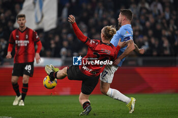 2024-03-01 - Simon Kjaer of A.C. Milan and Ciro Immobile of S.S. Lazio during the 27th day of the Serie A Championship between S.S. Lazio vs A.C. Milan, 1 March 2024 at the Olympic Stadium in Rome. - SS LAZIO VS AC MILAN - ITALIAN SERIE A - SOCCER