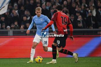 01/03/2024 - Gustav Isaksen of S.S. Lazio and Theo Hernandez of A.C. Milan during the 27th day of the Serie A Championship between S.S. Lazio vs A.C. Milan, 1 March 2024 at the Olympic Stadium in Rome. - SS LAZIO VS AC MILAN - SERIE A - CALCIO