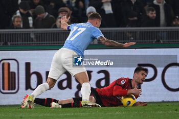 2024-03-01 - Ciro Immobile of S.S. Lazio and Christian Pulisic of A.C. Milan during the 27th day of the Serie A Championship between S.S. Lazio vs A.C. Milan, 1 March 2024 at the Olympic Stadium in Rome. - SS LAZIO VS AC MILAN - ITALIAN SERIE A - SOCCER