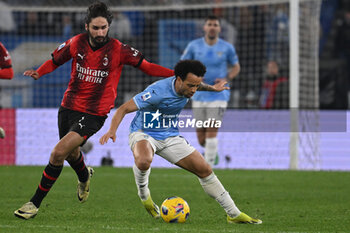 01/03/2024 - Yacine Adli of A.C. Milan and Felipe Anderson of S.S. Lazio during the 27th day of the Serie A Championship between S.S. Lazio vs A.C. Milan, 1 March 2024 at the Olympic Stadium in Rome. - SS LAZIO VS AC MILAN - SERIE A - CALCIO