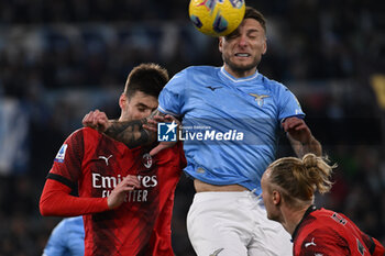 2024-03-01 - Matteo Gabbia A.C. Milan and Ciro Immobile of S.S. Lazio during the 27th day of the Serie A Championship between S.S. Lazio vs A.C. Milan, 1 March 2024 at the Olympic Stadium in Rome. - SS LAZIO VS AC MILAN - ITALIAN SERIE A - SOCCER