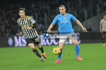 2024-03-03 - Stanislav Lobotka of SSC Napoli competes for the ball with Fabio Miretti of Juventus FC during the Serie A Match between SSC Napoli vs Juventus FC at Diego Armando Maradona Stadium - SSC NAPOLI VS JUVENTUS FC - ITALIAN SERIE A - SOCCER