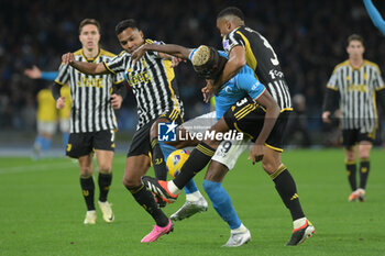 2024-03-03 - Bremer of Juventus FC competes for the ball with Victor Osimen of SSC Napoli during the Serie A Match between SSC Napoli vs Juventus FC at Diego Armando Maradona Stadium - SSC NAPOLI VS JUVENTUS FC - ITALIAN SERIE A - SOCCER