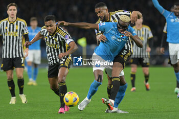 2024-03-03 - Bremer of Juventus FC competes for the ball with Victor Osimen of SSC Napoli during the Serie A Match between SSC Napoli vs Juventus FC at Diego Armando Maradona Stadium - SSC NAPOLI VS JUVENTUS FC - ITALIAN SERIE A - SOCCER