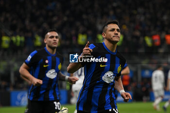 2024-03-04 - Alexis Sanchez of Fc Inter celebrating after a goal during the Italian Serie A football match between Inter FC Internazionale and Genoa CFC on 4 of March 2024 at Giuseppe Meazza San Siro Siro stadium in Milan, Italy. Photo Tiziano Ballabio - INTER - FC INTERNAZIONALE VS GENOA CFC - ITALIAN SERIE A - SOCCER