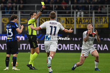 2024-03-04 - Referee Giovanni Ayroldi shows yellow card to Morten Frendrup of Genoa CFC during the Italian Serie A football match between Inter FC Internazionale and Genoa CFC on 4 of March 2024 at Giuseppe Meazza San Siro Siro stadium in Milan, Italy. Photo Tiziano Ballabio - INTER - FC INTERNAZIONALE VS GENOA CFC - ITALIAN SERIE A - SOCCER