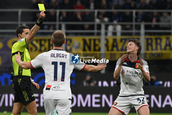 2024-03-04 - Referee Giovanni Ayroldi shows yellow card to Morten Frendrup of Genoa CFC during the Italian Serie A football match between Inter FC Internazionale and Genoa CFC on 4 of March 2024 at Giuseppe Meazza San Siro Siro stadium in Milan, Italy. Photo Tiziano Ballabio - INTER - FC INTERNAZIONALE VS GENOA CFC - ITALIAN SERIE A - SOCCER