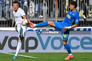 2024-10-20 - SSC Napoli's defender Amir Rrahmani against Empoli FC's forward Sebastiano Esposito - EMPOLI FC VS SSC NAPOLI - ITALIAN SERIE A - SOCCER