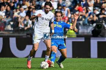 2024-10-20 - SSC Napoli's forward Khvicha Kvaratskhelia against Empoli FC's midfielder Jacopo Fazzini - EMPOLI FC VS SSC NAPOLI - ITALIAN SERIE A - SOCCER