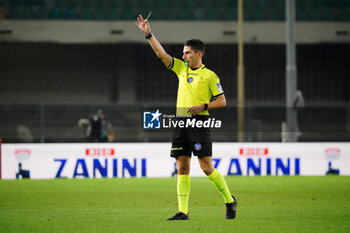 2024-10-21 - Federico Dionisi (Referee) shows the yellow card - HELLAS VERONA FC VS AC MONZA - ITALIAN SERIE A - SOCCER