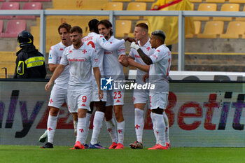 2024-10-20 - Andrea Colpani of Fiorentina celebrates after scoring a goal with teammates - US LECCE VS ACF FIORENTINA - ITALIAN SERIE A - SOCCER