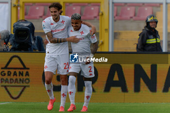 2024-10-20 - Andrea Colpani of Fiorentina celebrates after scoring a goal with Dodo of Fiorentina - US LECCE VS ACF FIORENTINA - ITALIAN SERIE A - SOCCER