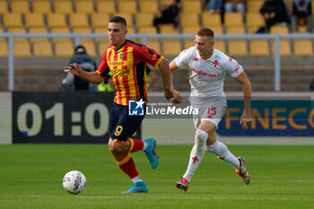 2024-10-20 - Nikola Krstovic of US Lecce in action against Pietro Comuzzo of Fiorentina - US LECCE VS ACF FIORENTINA - ITALIAN SERIE A - SOCCER