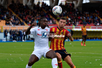 2024-10-20 - Moise Kean of Fiorentina in action against Frederic Guilbert of US Lecce - US LECCE VS ACF FIORENTINA - ITALIAN SERIE A - SOCCER