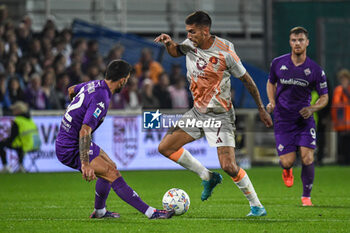 2024-10-27 - Lorenzo Pellegrini (Roma) hampered by Danilo Cataldi (Fiorentina) - ACF FIORENTINA VS AS ROMA - ITALIAN SERIE A - SOCCER