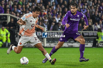 2024-10-27 - Paulo Dybala (Roma) hampered by Luca Ranieri (Fiorentina) - ACF FIORENTINA VS AS ROMA - ITALIAN SERIE A - SOCCER