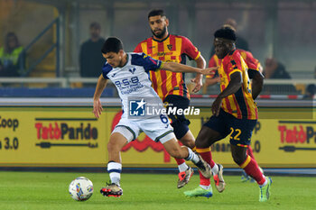 2024-10-29 - Reda Belahyane of Hellas Verona in action against Lameck Banda of US Lecce - US LECCE VS HELLAS VERONA FC - ITALIAN SERIE A - SOCCER