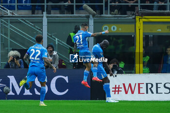 2024-10-29 - Romelu Lukaku of SSC Napoli celebrates with his teammates after scoring a goal during Serie A 2024/25 football match between AC Milan and SSC Napoli at San Siro Stadium - AC MILAN VS SSC NAPOLI - ITALIAN SERIE A - SOCCER