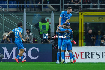 2024-10-29 - Romelu Lukaku of SSC Napoli celebrates with his teammates after scoring a goal during Serie A 2024/25 football match between AC Milan and SSC Napoli at San Siro Stadium - AC MILAN VS SSC NAPOLI - ITALIAN SERIE A - SOCCER