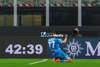 2024-10-29 - Khvicha Kvaratskhelia of SSC Napoli celebrates after scoring a goal during Serie A 2024/25 football match between AC Milan and SSC Napoli at San Siro Stadium - AC MILAN VS SSC NAPOLI - ITALIAN SERIE A - SOCCER