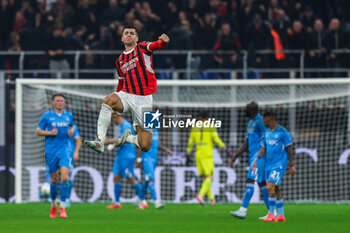 2024-10-29 - Alvaro Morata of AC Milan celebrates after scoring a goal (goal will be disallowed by Video Assistant Referee due to offside) during Serie A 2024/25 football match between AC Milan and SSC Napoli at San Siro Stadium - AC MILAN VS SSC NAPOLI - ITALIAN SERIE A - SOCCER