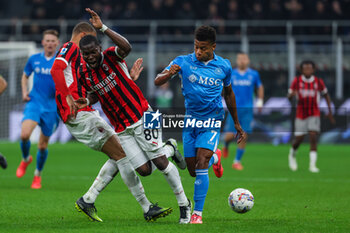 2024-10-29 - David Neres of SSC Napoli competes for the ball with Yunus Musah of AC Milan during Serie A 2024/25 football match between AC Milan and SSC Napoli at San Siro Stadium - AC MILAN VS SSC NAPOLI - ITALIAN SERIE A - SOCCER