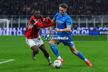 2024-10-29 - Scott Francis McTominay of SSC Napoli competes for the ball with Youssouf Fofana of AC Milan during Serie A 2024/25 football match between AC Milan and SSC Napoli at San Siro Stadium - AC MILAN VS SSC NAPOLI - ITALIAN SERIE A - SOCCER