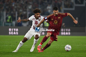 2024-10-31 - Valentino Lazaro of Torino F.C. and Zeki Celik of A.S. Roma in action during the 10th day of the Serie A Championship between A.S. Roma and Torino F.C. at the Olympic Stadium on October 31, 2024 in Rome, Italy. - AS ROMA VS TORINO FC - ITALIAN SERIE A - SOCCER