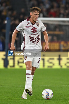 2024-10-31 - Mergim Vojvoda of Torino F.C. in action during the 10th day of the Serie A Championship between A.S. Roma and Torino F.C. at the Olympic Stadium on October 31, 2024 in Rome, Italy. - AS ROMA VS TORINO FC - ITALIAN SERIE A - SOCCER