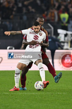 2024-10-31 - Antonio Sanabria of Torino F.C. and Evan Ndicka of A.S. Roma in action during the 10th day of the Serie A Championship between A.S. Roma and Torino F.C. at the Olympic Stadium on October 31, 2024 in Rome, Italy. - AS ROMA VS TORINO FC - ITALIAN SERIE A - SOCCER