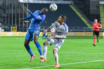 2024-11-04 - header of Emmanuel Gyasi (Empoli) hampered by Alberto Moreno (Como) - EMPOLI FC VS COMO 1907 - ITALIAN SERIE A - SOCCER