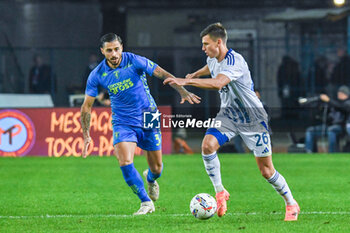 2024-11-04 - Yannik Engelhardt (Como) hampered by Giuseppe Pezzella (Empoli) - EMPOLI FC VS COMO 1907 - ITALIAN SERIE A - SOCCER