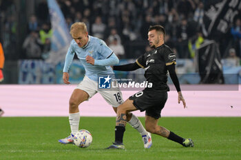 2024-11-04 - Lazio’s Gustav Isaksen  and Cagliari's Gianluca Gaetano during the Italian Football Championship League A 2024/2025 match between SS Lazio vs Cagliari Calcio at the Olimpic Stadium in Rome on 04 November 2024. - SS LAZIO VS CAGLIARI CALCIO - ITALIAN SERIE A - SOCCER