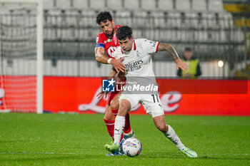 2024-11-02 - Christian Pulisic (AC Milan) and Pablo Mari (AC Monza) - AC MONZA VS AC MILAN - ITALIAN SERIE A - SOCCER