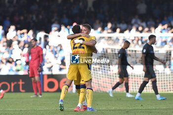 2024-11-03 - Matteo Ruggeri of Atalanta BC rejoices after scoring a goal of 0-3 with his teammate Matteo Ruggeri of Atalanta BC during the Serie A Enelive betwee SSC Napoli vs Atalanta BC at Diego Armando MAradona Stadium - SSC NAPOLI VS ATALANTA BC - ITALIAN SERIE A - SOCCER