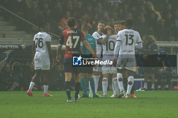 2024-11-04 - Adrian Bernabe (Parma Calcio) is consoled by his teammates after his injury - PARMA CALCIO VS GENOA CFC - ITALIAN SERIE A - SOCCER