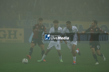 2024-11-04 - Simon Sohm (Parma Calcio) and Anas Haj Mohamed (Parma Calcio) in action against Milan Badelj (Genoa CFC) - PARMA CALCIO VS GENOA CFC - ITALIAN SERIE A - SOCCER