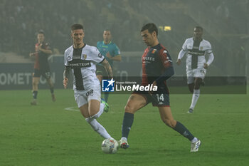 2024-11-04 - Alessandro Vogliacco (Genoa CFC) in action against Dennis Man (Parma Calcio) - PARMA CALCIO VS GENOA CFC - ITALIAN SERIE A - SOCCER