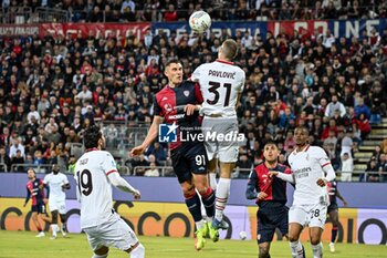 2024-11-09 - Roberto Piccoli of Cagliari Calcio, Strahinja Pavlovic of AC Milan - CAGLIARI CALCIO VS AC MILAN - ITALIAN SERIE A - SOCCER