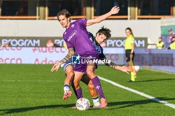 2024-11-10 - Fiorentina's Andrea Colpani hampered by Verona's Domagoj Bradaric - ACF FIORENTINA VS HELLAS VERONA FC - ITALIAN SERIE A - SOCCER