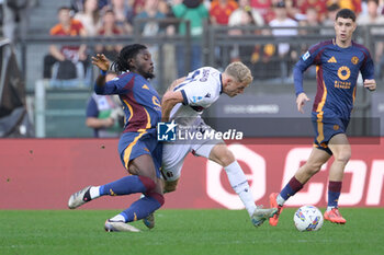 2024-11-10 - Roma’s Manu Kone’ and Bologna's Jens Odgaard during the Italian Football Championship League A Enilive 2024/2025 match between AS Roma vs Bologna FC at the Olimpic Stadium in Rome on 10 November 2024. - AS ROMA VS BOLOGNA FC - ITALIAN SERIE A - SOCCER