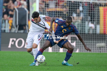 2024-11-10 - Bologna's Santiago Castro and Roma’s Evan Ndicka during the Italian Football Championship League A Enilive 2024/2025 match between AS Roma vs Bologna FC at the Olimpic Stadium in Rome on 10 November 2024. - AS ROMA VS BOLOGNA FC - ITALIAN SERIE A - SOCCER