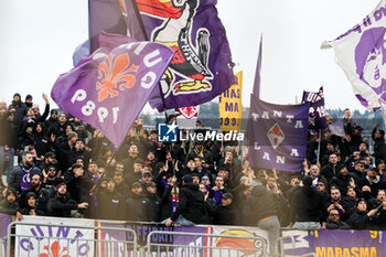 2024-11-24 - supporters of curva (ACF Fiorentina) Soccer - Italian ,Serie A - Como 1907 vs ACF Fiorentina , 2024-25 game at Stadio Giuseppe Sinigaglia in Como (CO), Italy, 24.11.2024. Photo by Marius Bunduc/LiveMedia - COMO 1907 VS ACF FIORENTINA - ITALIAN SERIE A - SOCCER