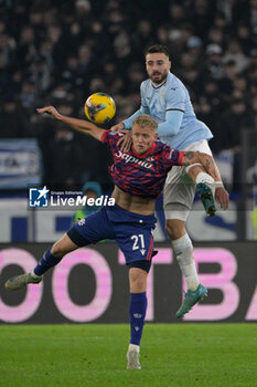 2024-11-24 - Bologna's Jens Odgaard and Lazio’s Mario Gila  during the Italian Football Championship League A 2024/2025 match between SS Lazio vs Bologna FC at the Olimpic Stadium in Rome on 24 November 2024. - SS LAZIO VS BOLOGNA FC - ITALIAN SERIE A - SOCCER