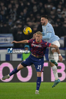 2024-11-24 - Bologna's Jens Odgaard and Lazio’s Mario Gila during the Italian Football Championship League A 2024/2025 match between SS Lazio vs Bologna FC at the Olimpic Stadium in Rome on 24 November 2024. - SS LAZIO VS BOLOGNA FC - ITALIAN SERIE A - SOCCER