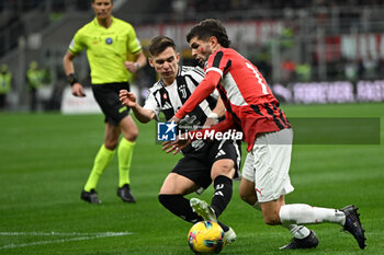 2024-11-23 - Christian Pulisic of AC Milan and Francisco Conceicao of FC Juventus during the Italian Serie A football match between AC Milan and FC Juventus on November 23, 2024 at Giuseppe Meazza San Siro Siro stadium in Milan, Italy - AC MILAN VS JUVENTUS FC - ITALIAN SERIE A - SOCCER