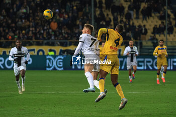 2024-11-23 - Adrian Benedyczak (Parma Calcio) fights for the ball against Isak Hien (Atalanta BC) - PARMA CALCIO VS ATALANTA BC - ITALIAN SERIE A - SOCCER