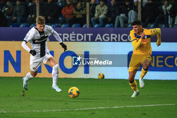 2024-11-23 - Adrian Benedyczak (Parma Calcio) fights for the ball against Raoul Bellanova (Atalanta BC) - PARMA CALCIO VS ATALANTA BC - ITALIAN SERIE A - SOCCER